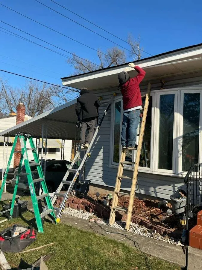 Restoration crew performing exterior repair in Shenango